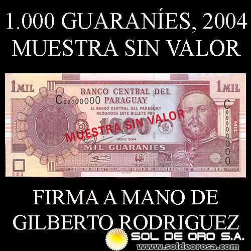 NUMIS - BILLETES DEL PARAGUAY - 2004 - MIL GUARANIES (MC219.m) - FIRMAS: GILBERTO RODRIGUEZ GARCETE - ANGEL RODRIGUEZ CACERES - MUESTRA SIN VALOR - FIRMADO A MANO POR GILBERTO RODRIGUEZ - BANCO CENTRAL DEL PARAGUAY